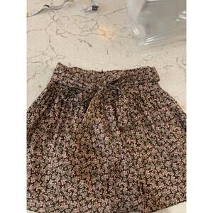 Brown floral mini skirt by Blue Exchange in a women’s size small